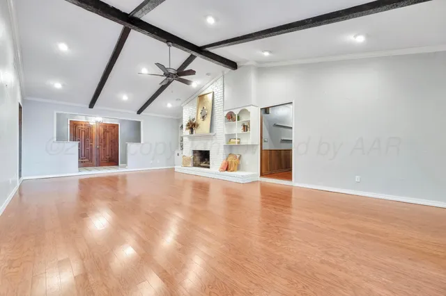 an aerial view of residential building with parking space