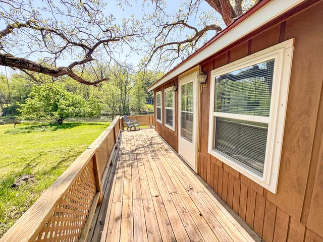 a view of swimming pool with a patio