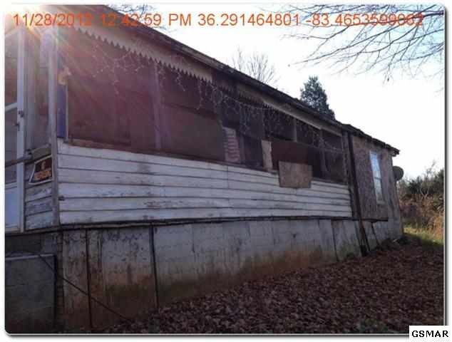 1140 Rocky Flat Road Rutledge, TN 37861 - Photo 1 of 1 a backyard of a house