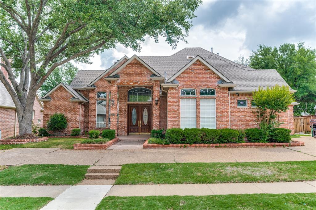 7011 Old York Road McKinney, TX 75072 - Photo 1 of 30 a front view of a house with a yard and potted plants