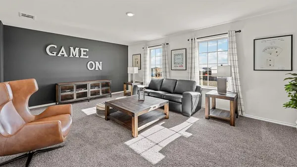 a living room with furniture or couch and a window