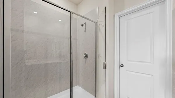 a bathroom with a double vanity sink mirror and