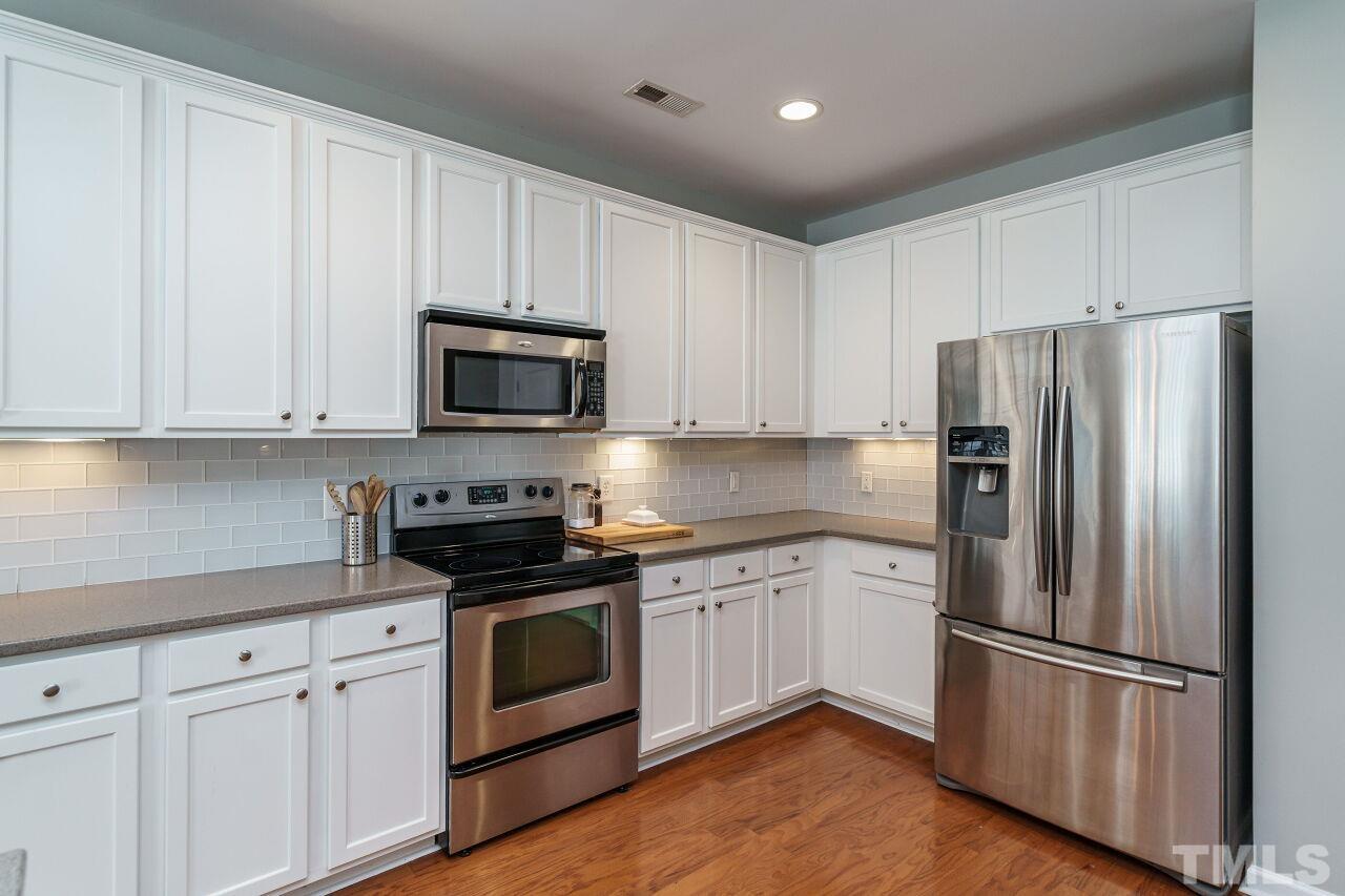 2543 Asher View Court Raleigh, NC 27606 - Photo 15 of 30 All appliances convey with the sale of this home.