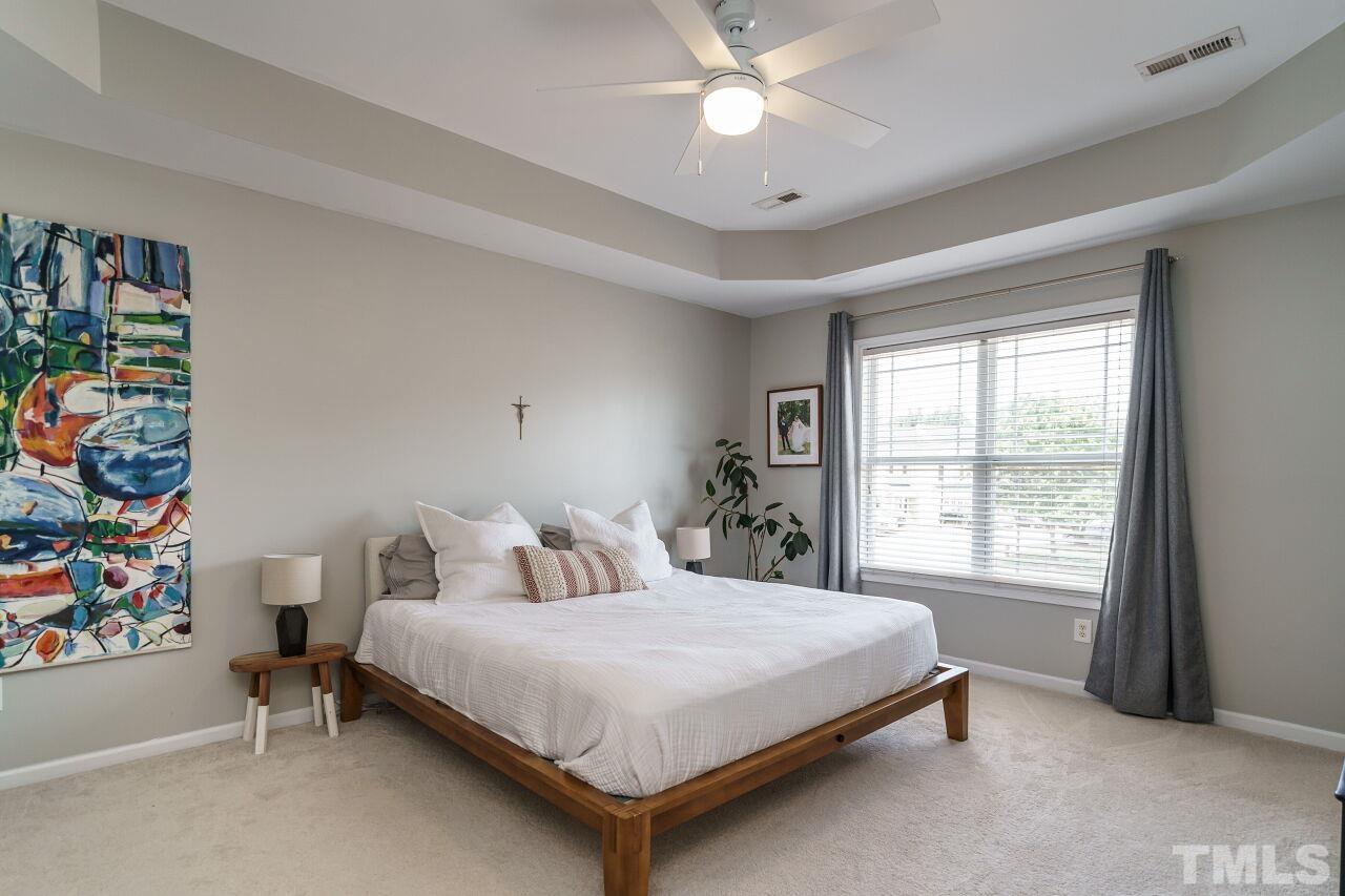 2543 Asher View Court Raleigh, NC 27606 - Photo 17 of 30 The spacious master suite is located on the second floor.