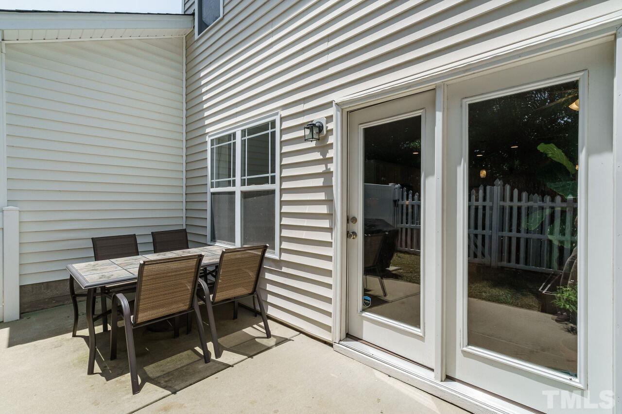 2543 Asher View Court Raleigh, NC 27606 - Photo 27 of 30 You will also find a storage closet just off the patio.