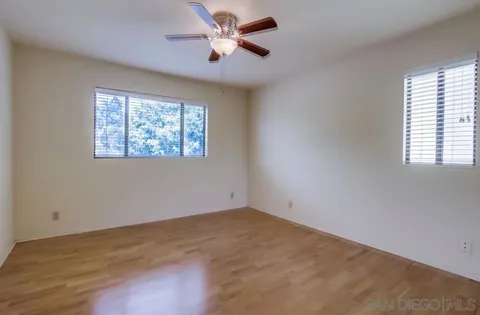 a kitchen with a sink stove and refrigerator