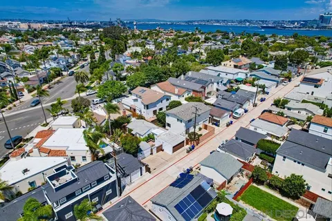 a front view of a house with a garage