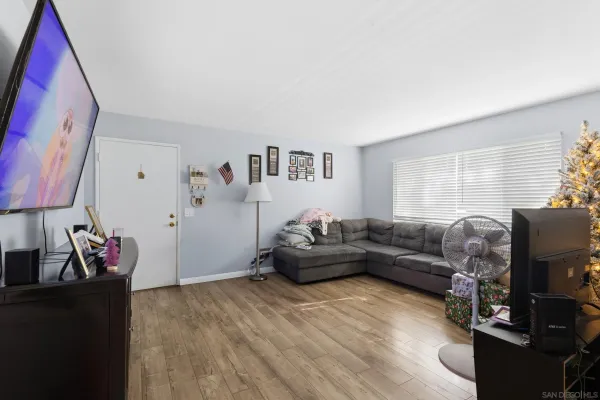 a living room with furniture and a window