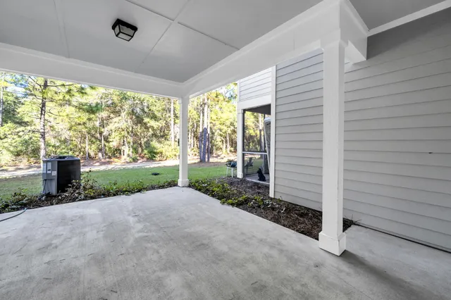a view of a garden with an outdoor space