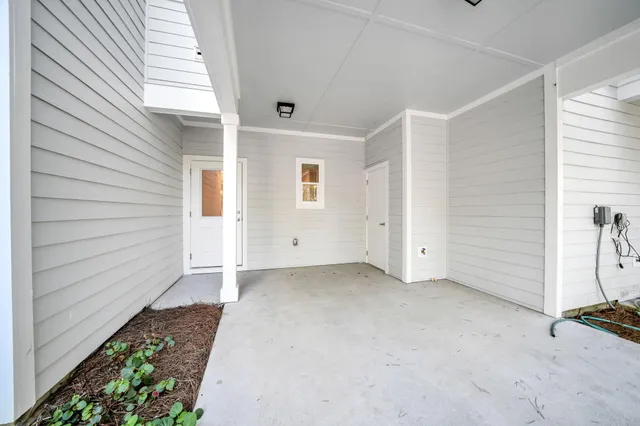 a view of a room that has a window