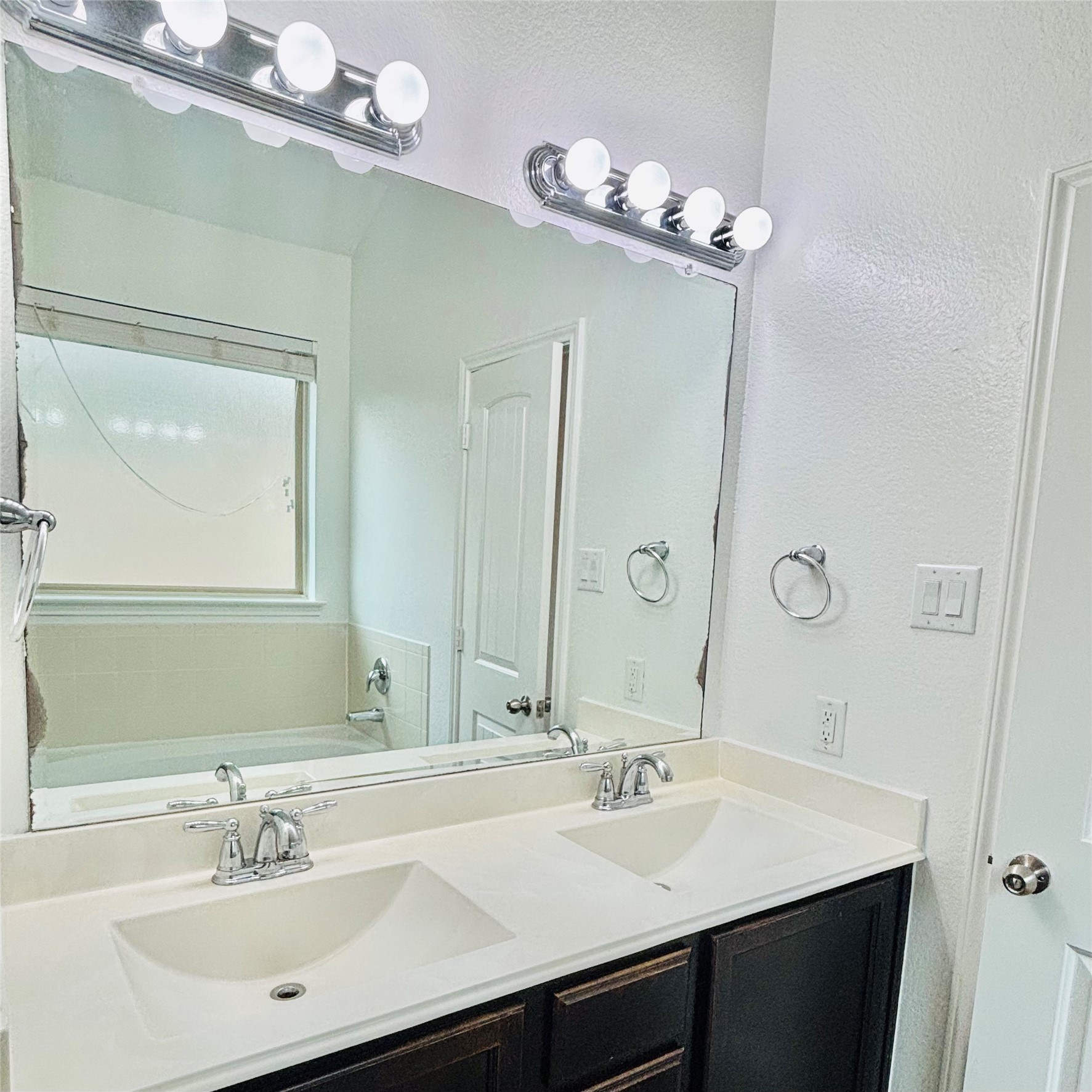 22480 Toronado Ridge Lane Porter, TX 77365 - Photo 29 of 42 a bathroom with a sink a mirror and a vanity