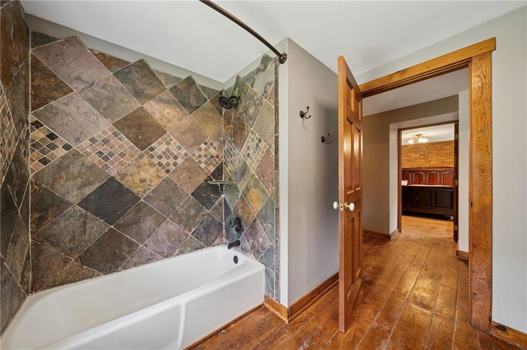 41 Columbia Road Monongahela, PA 15063 - Photo 20 of 37 a bathroom with a bathtub and a shower