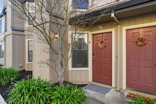 a view of a wooden door of the house