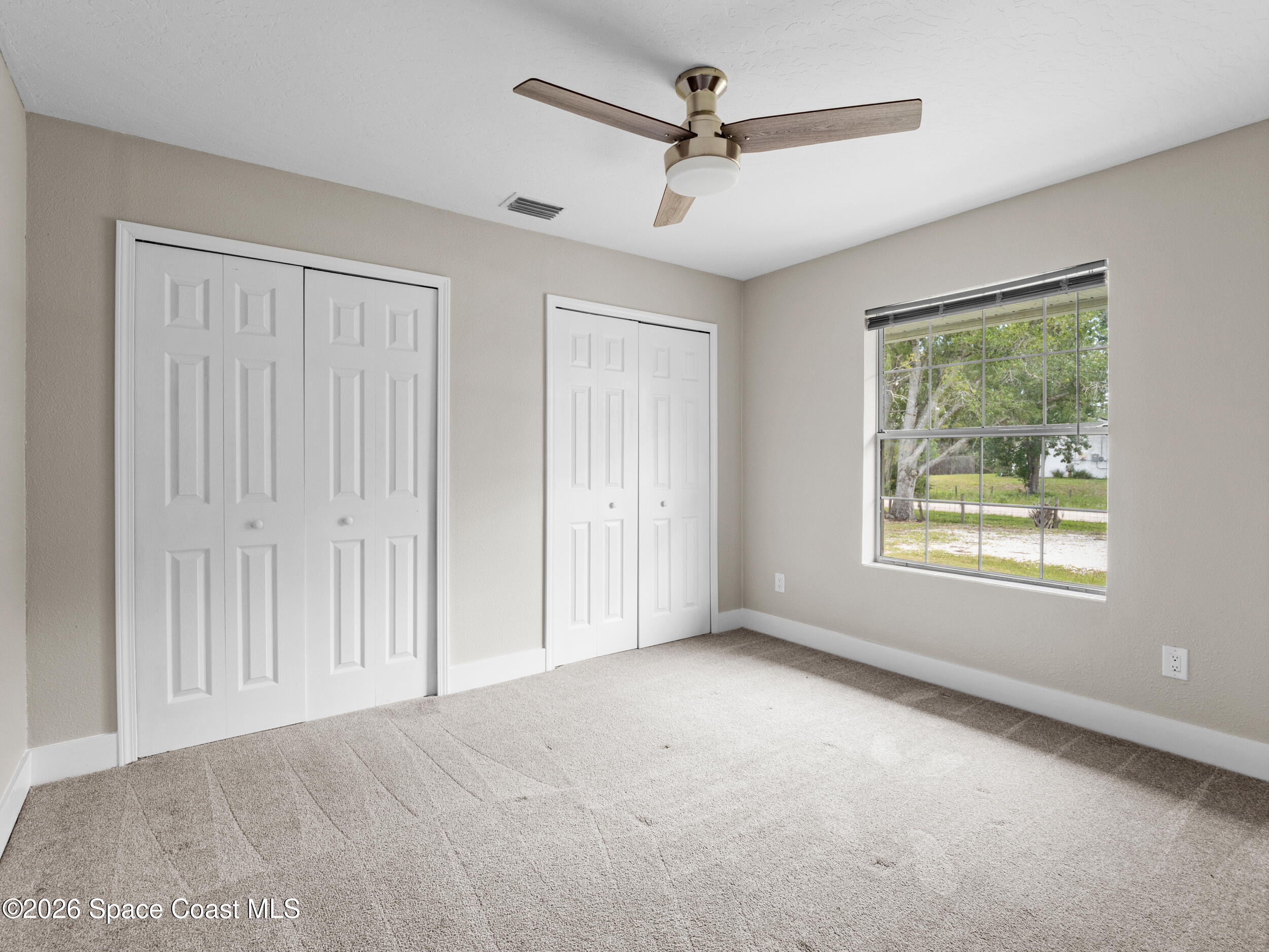 3480 Weber Road Malabar, FL 32950 - Photo 23 of 45 a view of an empty room with a window