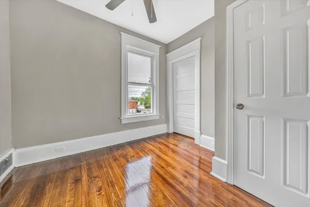 a view of an empty room and window