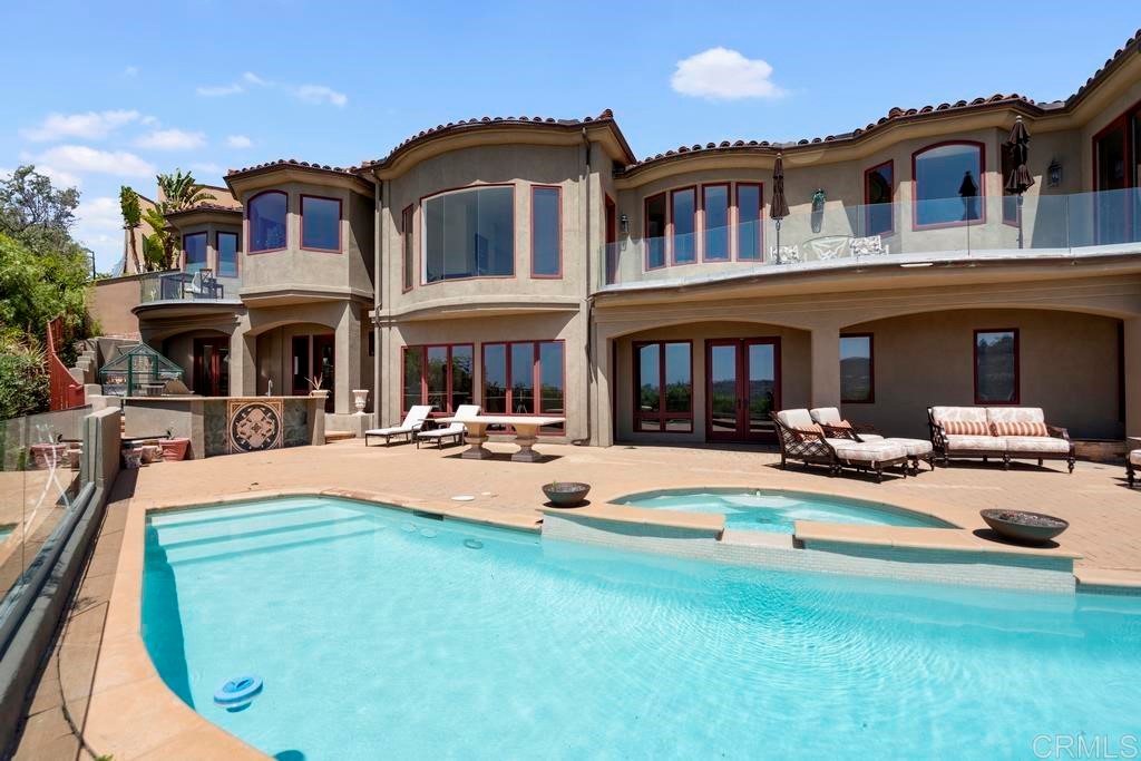 8606 Ruette Monte Carlo La Jolla, CA 92037 - Photo 13 of 13 a view of a house with swimming pool and sitting area