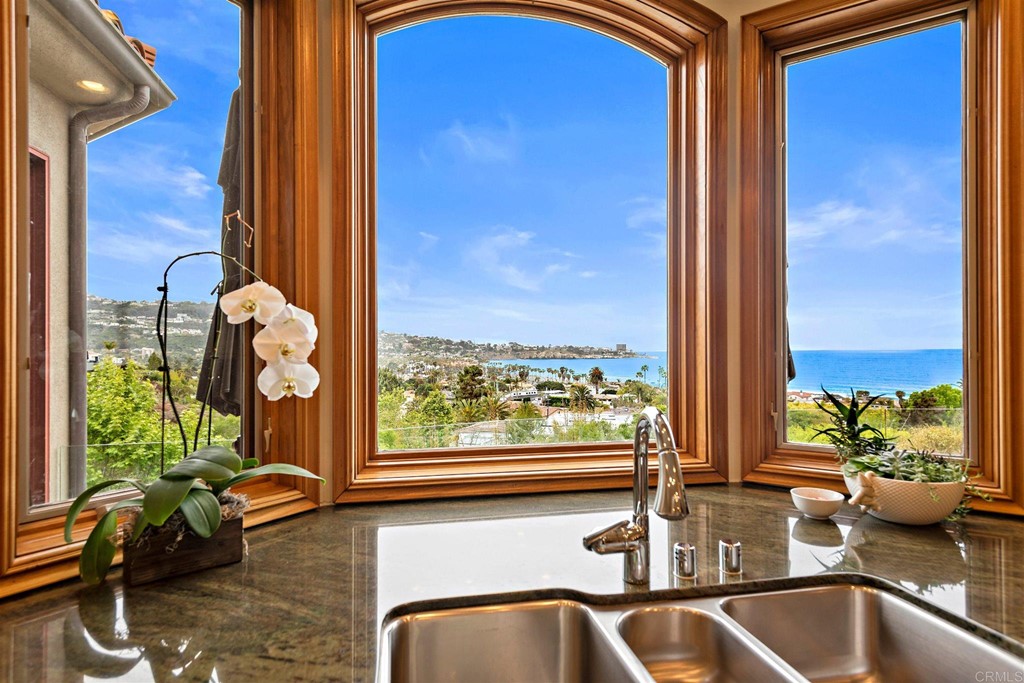 8606 Ruette Monte Carlo La Jolla, CA 92037 - Photo 6 of 13 a kitchen with a sink and a window