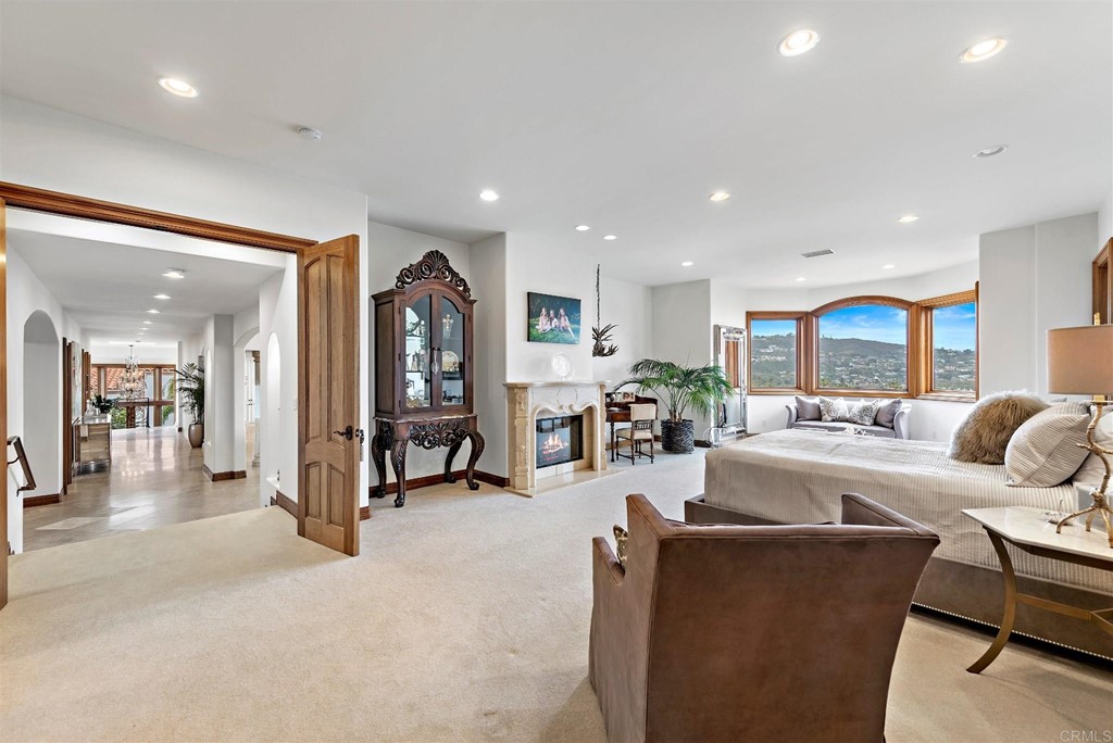 8606 Ruette Monte Carlo La Jolla, CA 92037 - Photo 10 of 13 a living room with furniture and a large window