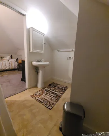 a bathroom with a sink and a toilet