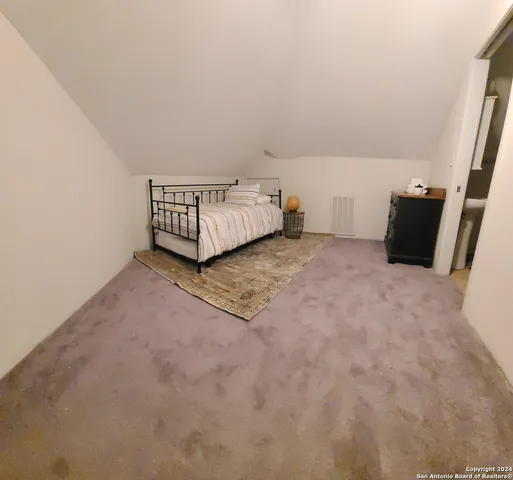 a view of a room with large window