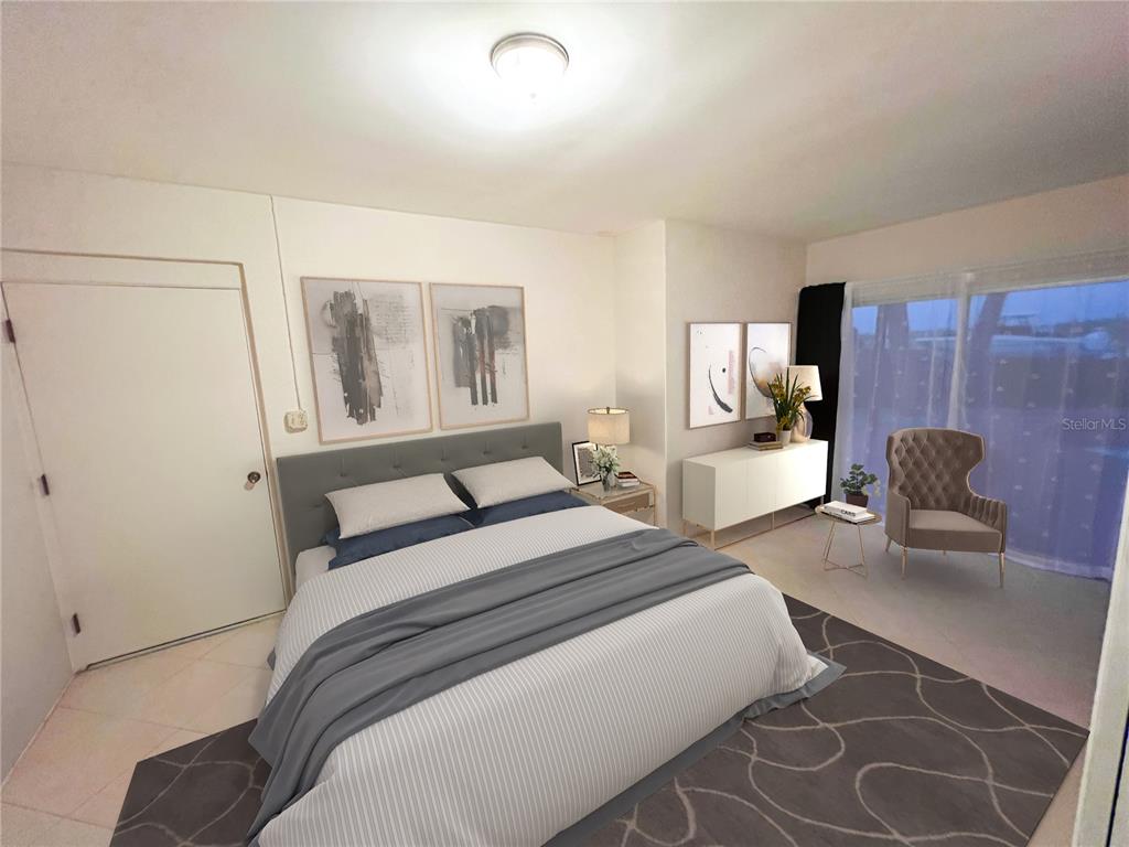 1210 Casey Key Road Nokomis, FL 34275 - Photo 17 of 22 a bedroom with a bed and wooden floor