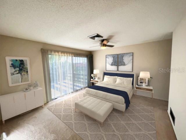 1210 Casey Key Road Nokomis, FL 34275 - Photo 4 of 22 a bedroom with a large bed and a chandelier
