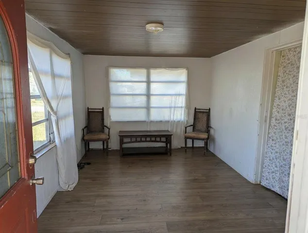 a room with furniture and a window