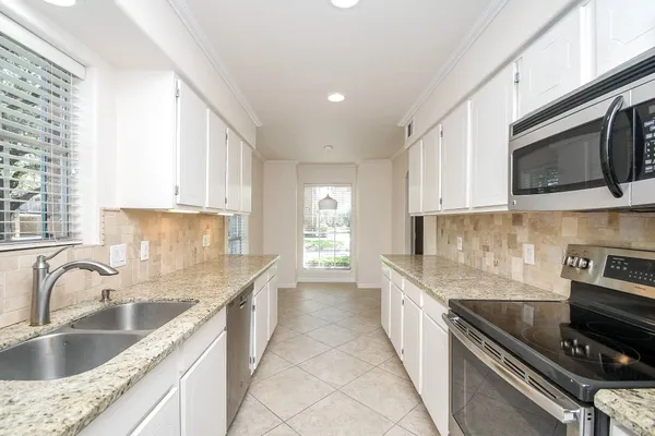 a view of kitchen and window