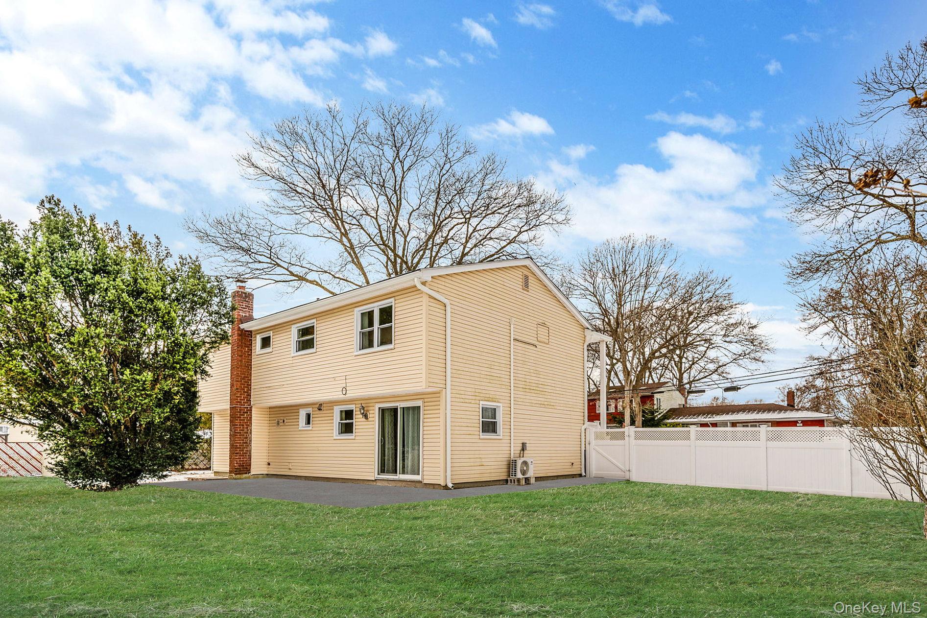 1663 Claas Avenue Holbrook, NY 11741 - Photo 23 of 28 a view of house with backyard