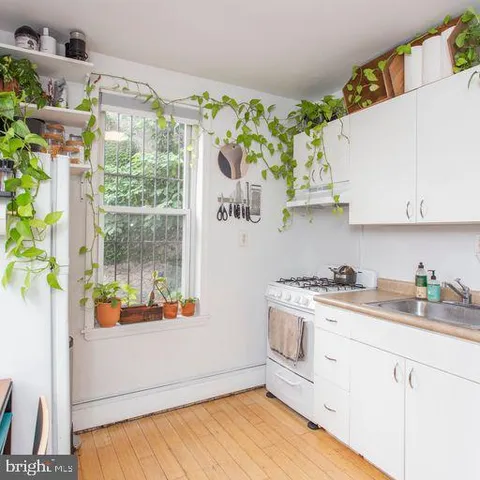 a table and chairs in a room