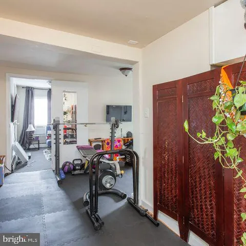 a view of a room with gym equipment