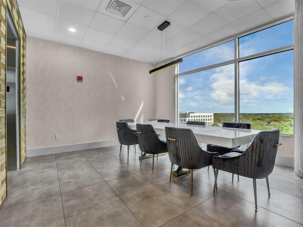 525 East Jackson Street Orlando, FL 32801 - Photo 19 of 65 a view of a dining room with furniture window and outside view