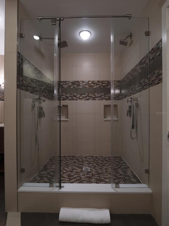 525 East Jackson Street Orlando, FL 32801 - Photo 28 of 65 a bathroom with a shower