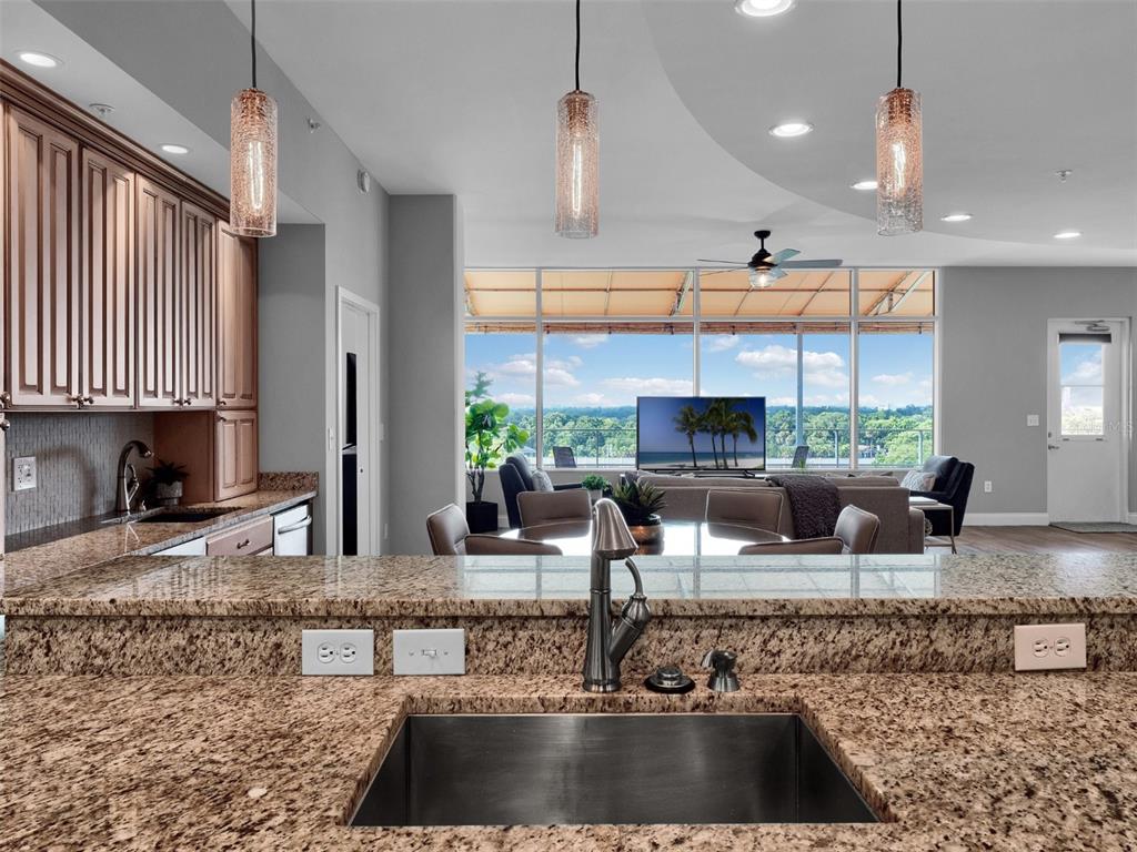 525 East Jackson Street Orlando, FL 32801 - Photo 40 of 65 a living room with fireplace furniture and a large window