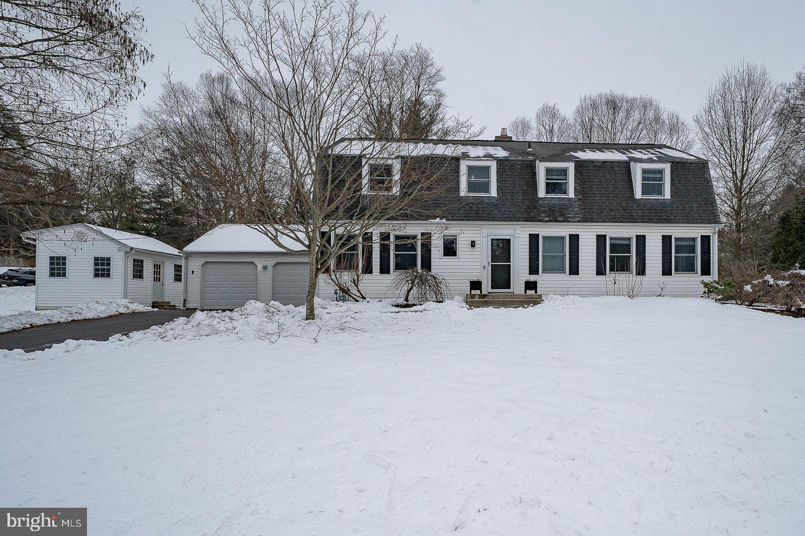1324 Karen Lane Wayne, PA 19087 - Photo 1 of 1 a front view of a building with a road