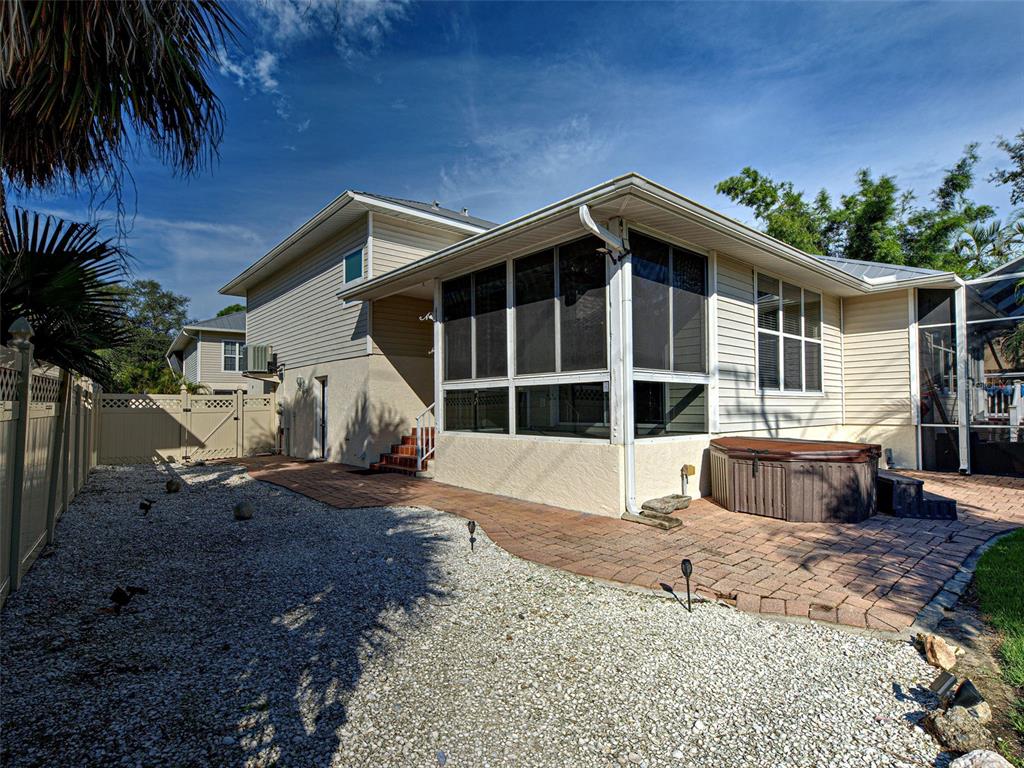 1801 Highland Road Osprey, FL 34229 - Photo 34 of 40 a front view of a house with a yard