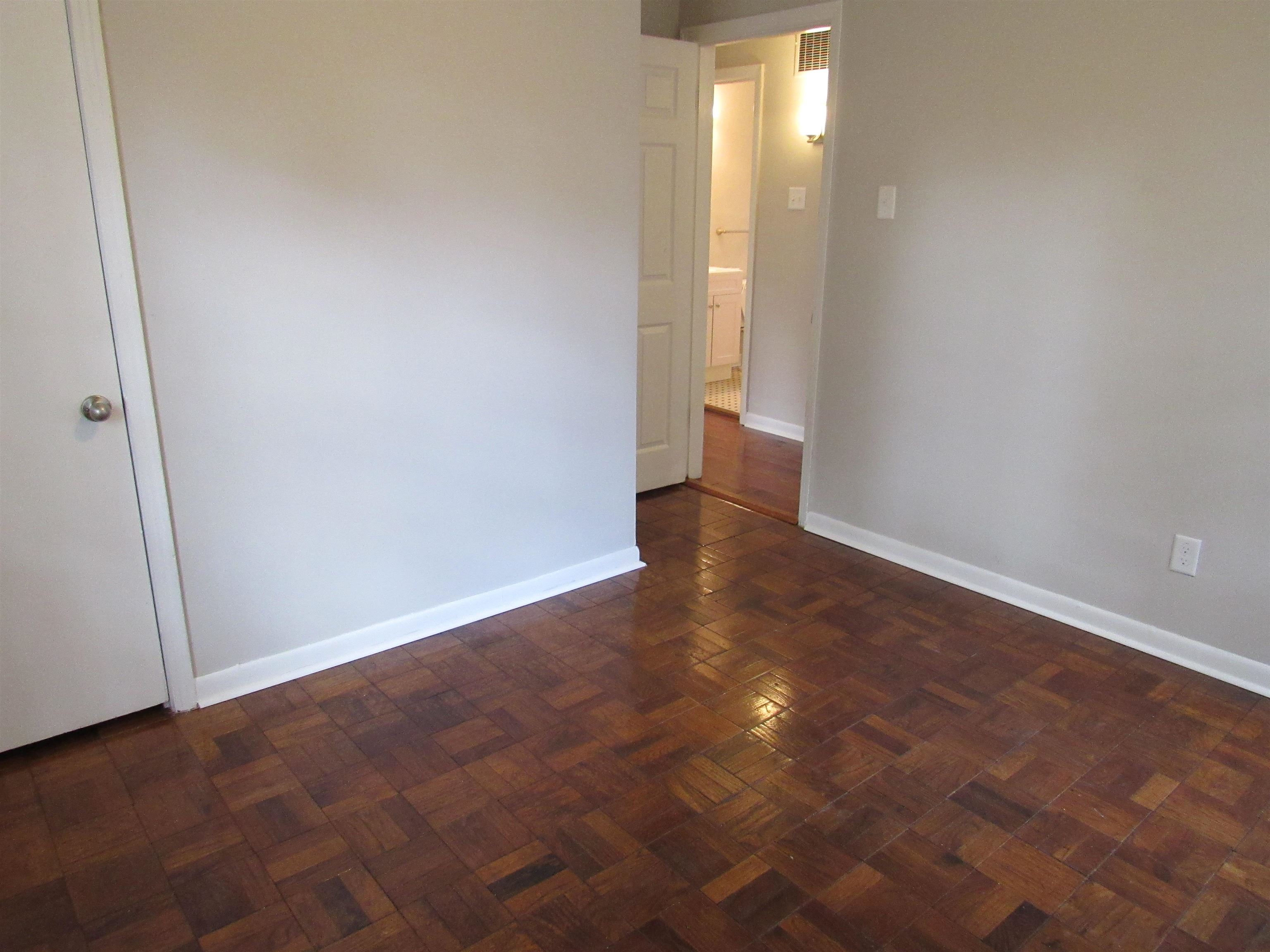 5055 Wingdale Road Memphis, TN 38117 - Photo 15 of 20 Empty room with parquet flooring