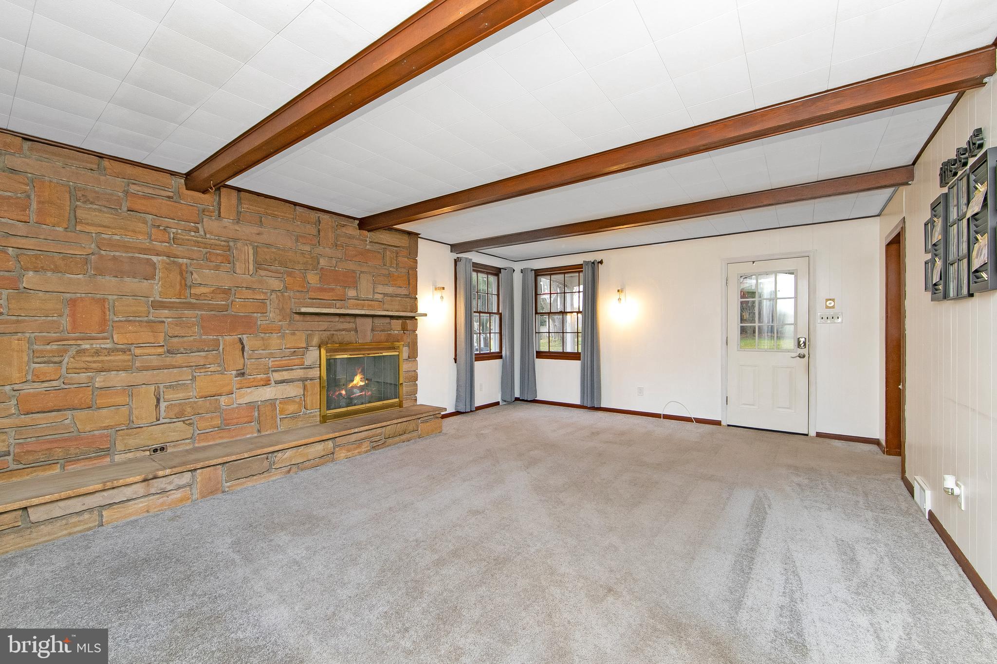 414 Stanfield Road Springfield, PA 19064 - Photo 22 of 51 a view of empty room with a fireplace