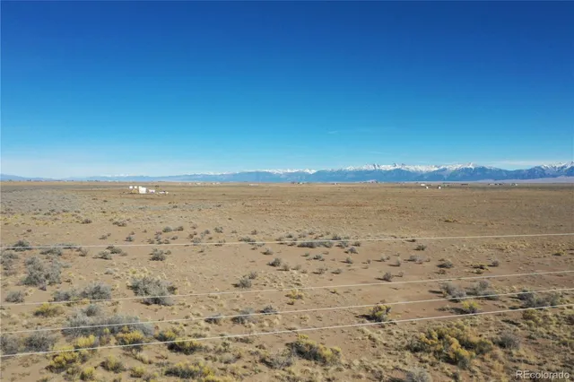 a view of an ocean & mountain