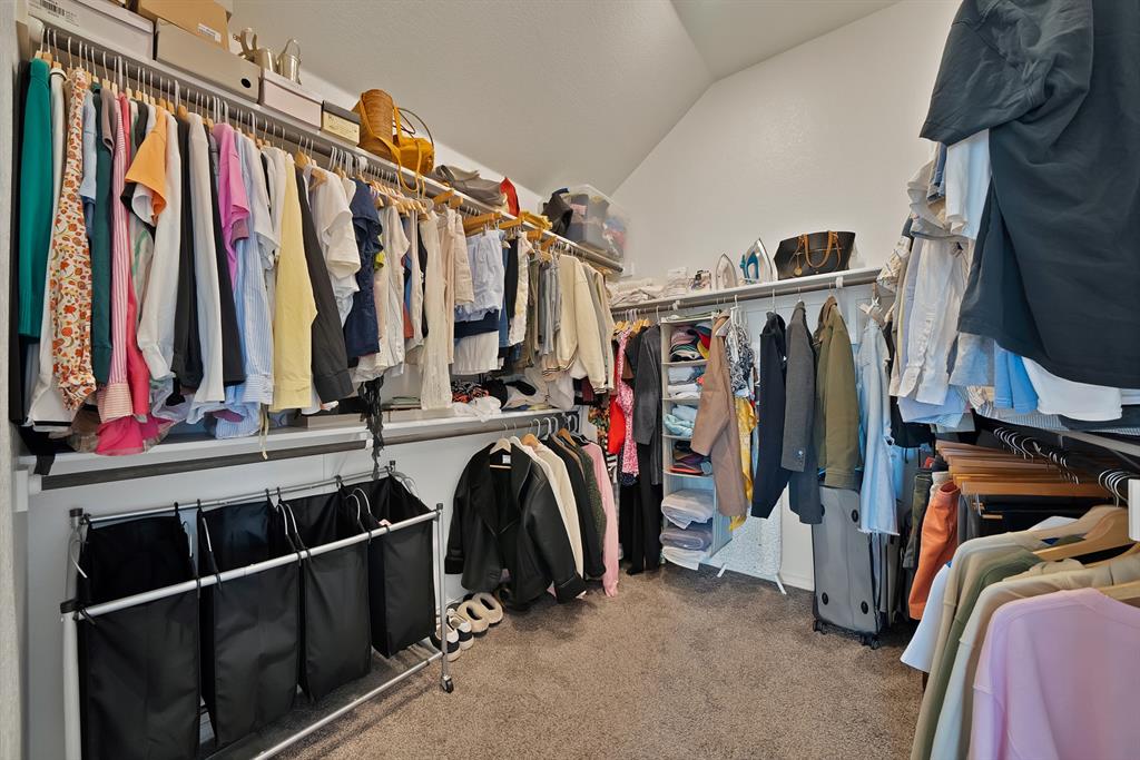 4054 Grove Valley Road Midlothian, TX 76065 - Photo 20 of 25 a view of walk in closet with clothes