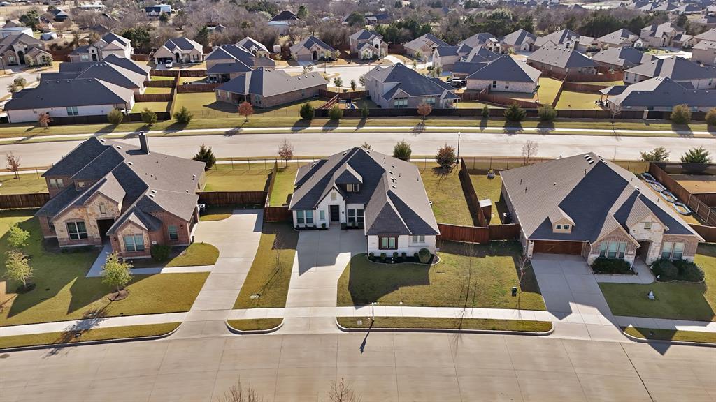 4054 Grove Valley Road Midlothian, TX 76065 - Photo 4 of 25 an aerial view of residential houses with outdoor space