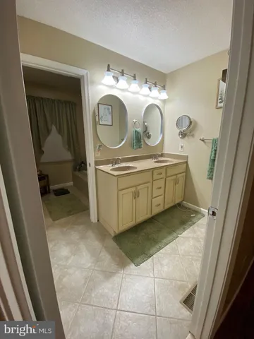 a utility room with a sink a washer and dryer