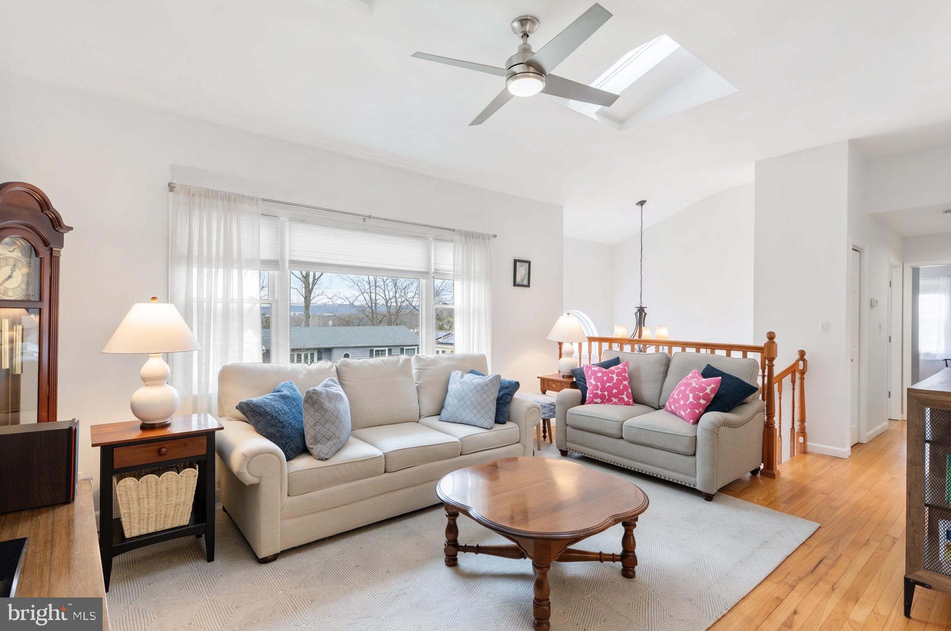 54 Highview Terrace Dover, NJ 07801 - Photo 16 of 35 a living room with furniture a rug potted plant and a window