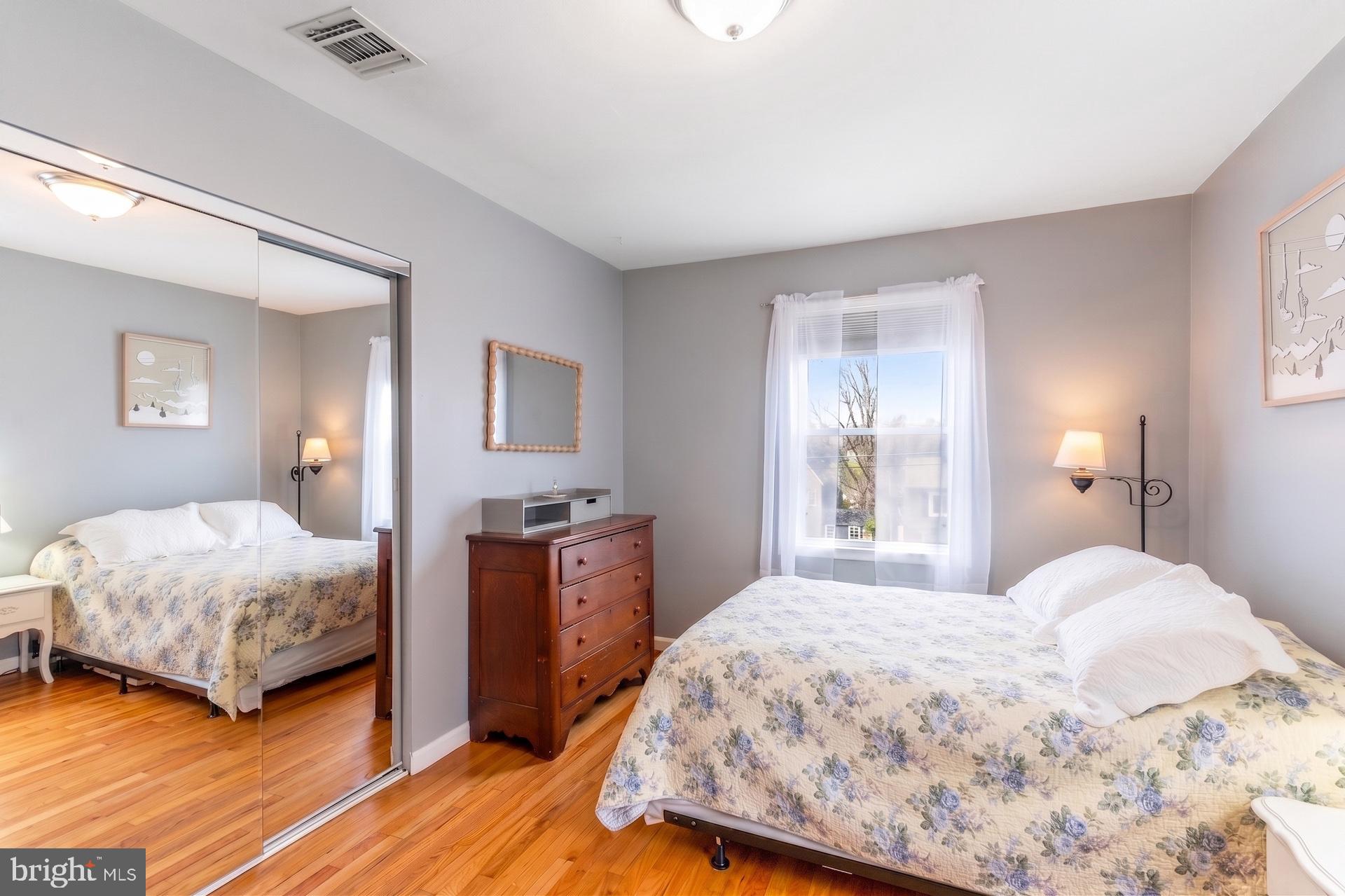 54 Highview Terrace Dover, NJ 07801 - Photo 18 of 35 a bedroom with a bed and a lamp