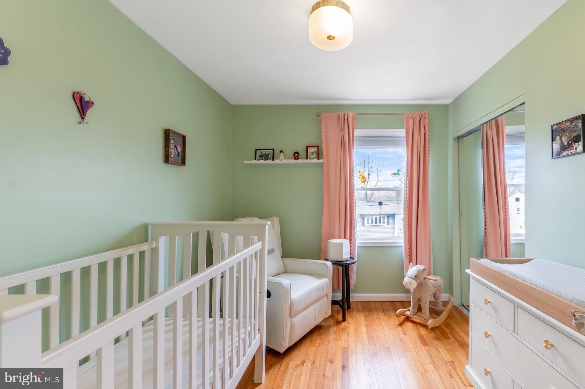 54 Highview Terrace Dover, NJ 07801 - Photo 22 of 35 a bedroom with furniture and a window