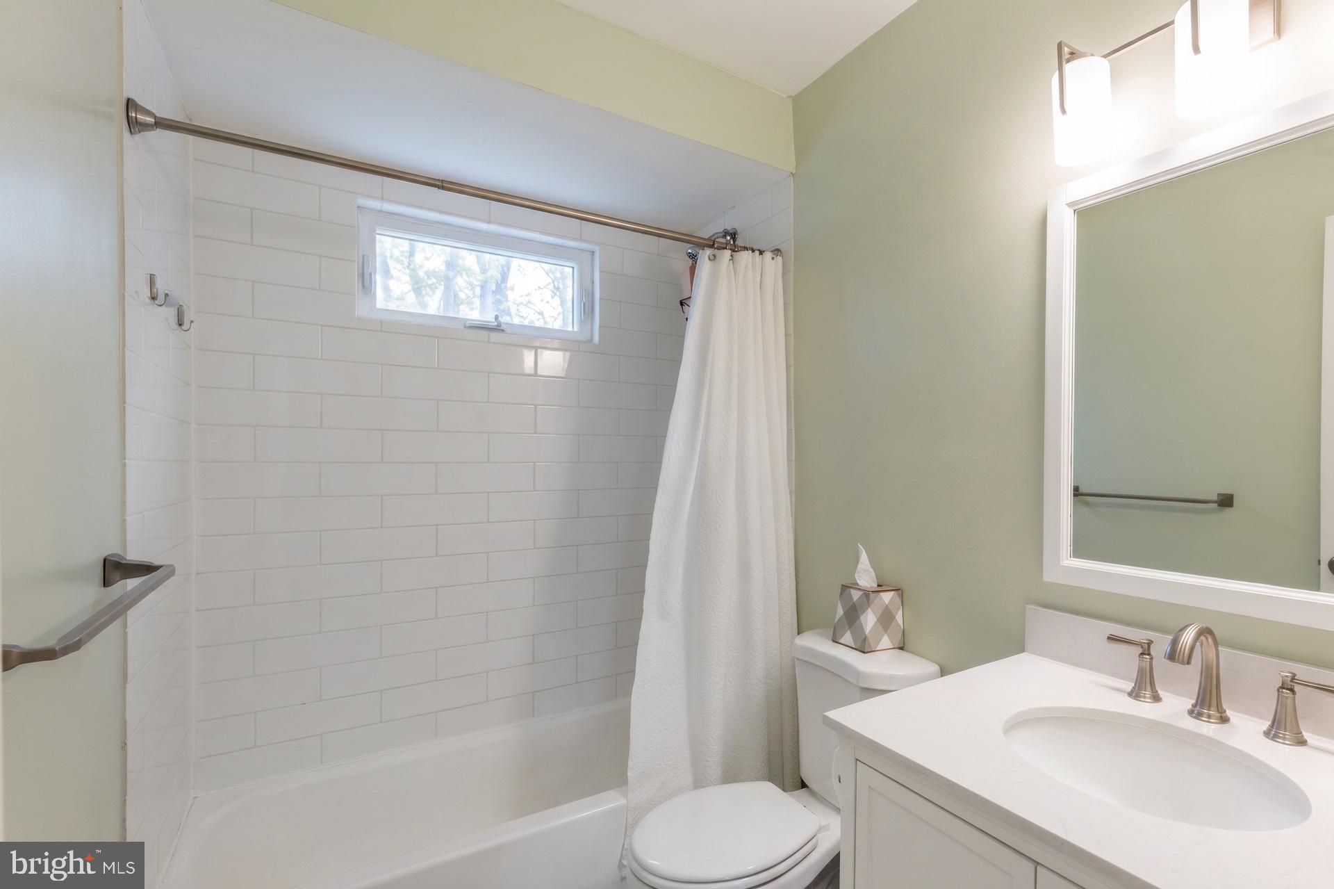 54 Highview Terrace Dover, NJ 07801 - Photo 23 of 35 a bathroom with a sink toilet and shower