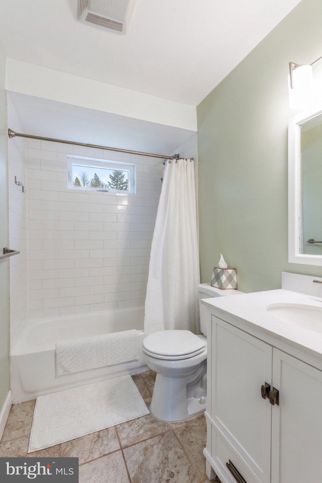 54 Highview Terrace Dover, NJ 07801 - Photo 24 of 35 a bathroom with a sink a toilet and shower
