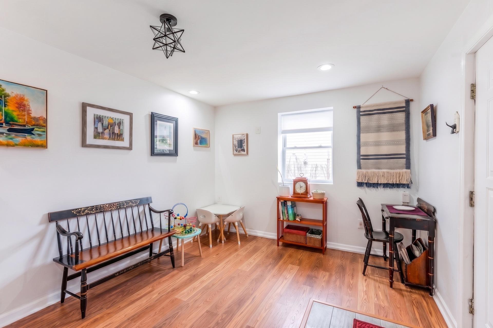 54 Highview Terrace Dover, NJ 07801 - Photo 6 of 35 a view of a workspace with furniture and wooden floor