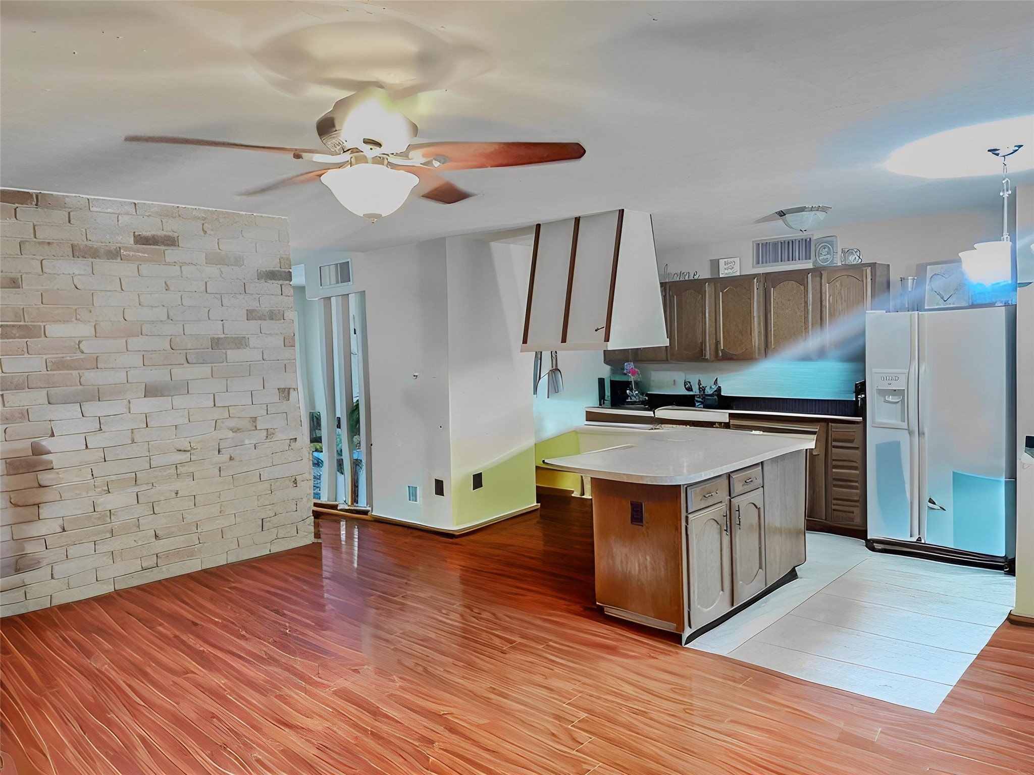15610 Briar Spring Court Houston, TX 77489 - Photo 3 of 7 a kitchen with stainless steel appliances a stove refrigerator and a dining table