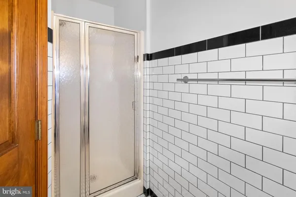 a view of a livingroom with furniture and a window